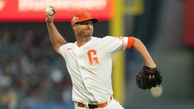 SF Giants starting pitcher Alex Cobb throws to first base during the fifth inning against the Oakland Athletics at Oracle Park on June 25, 2023.